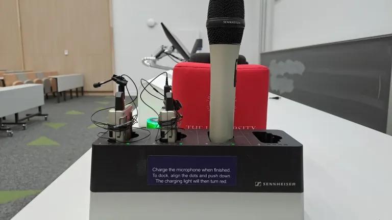 Photograph showing wireless microphones in a lecture room