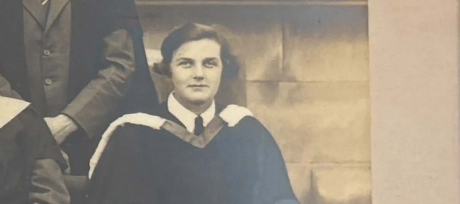 Black and white picture of Molly Fergusson during her University of Edinburgh graduation ceremony in 1936.
