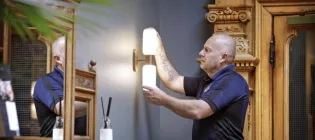 Man fixing a light