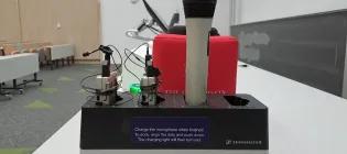 Photograph showing wireless microphones in a lecture room