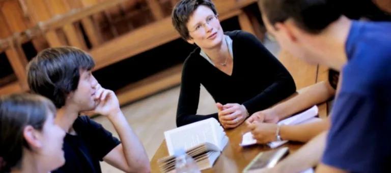 round-table discussion with books out