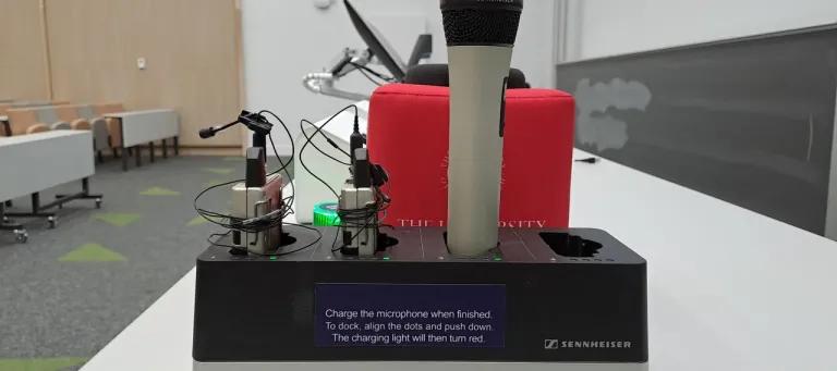 Photograph showing wireless microphones in a lecture room