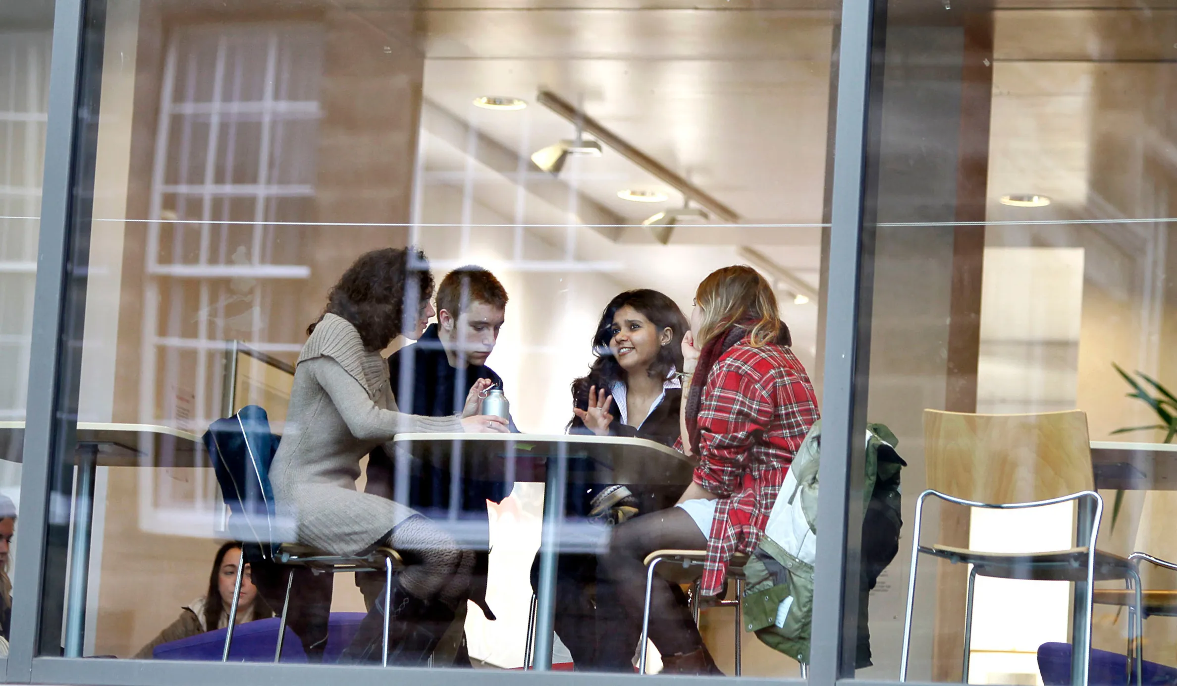 Students working together in relaxed environment