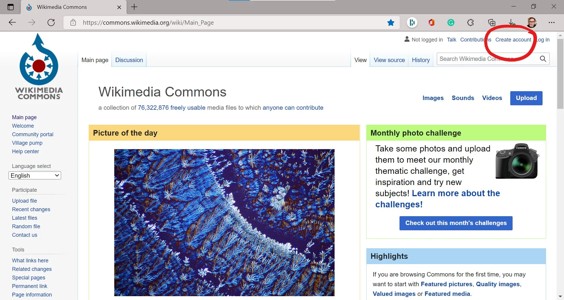 Main page of Wikimedia Commons, with \"Create account\" link circled in red.