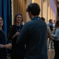 People smiling into the camera