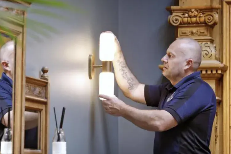 Man fixing a light