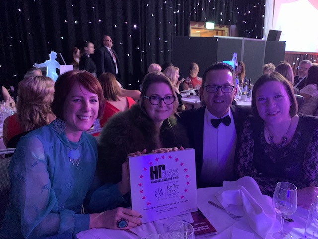 ISG colleagues with their award trophy at the Scottish HR Network Magazine Awards 2019