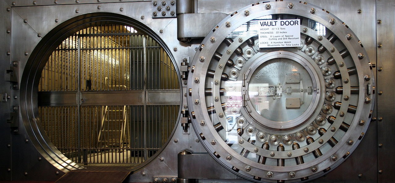 An open bank vault door.